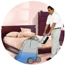 staff-cleaning-bed-room-carpet